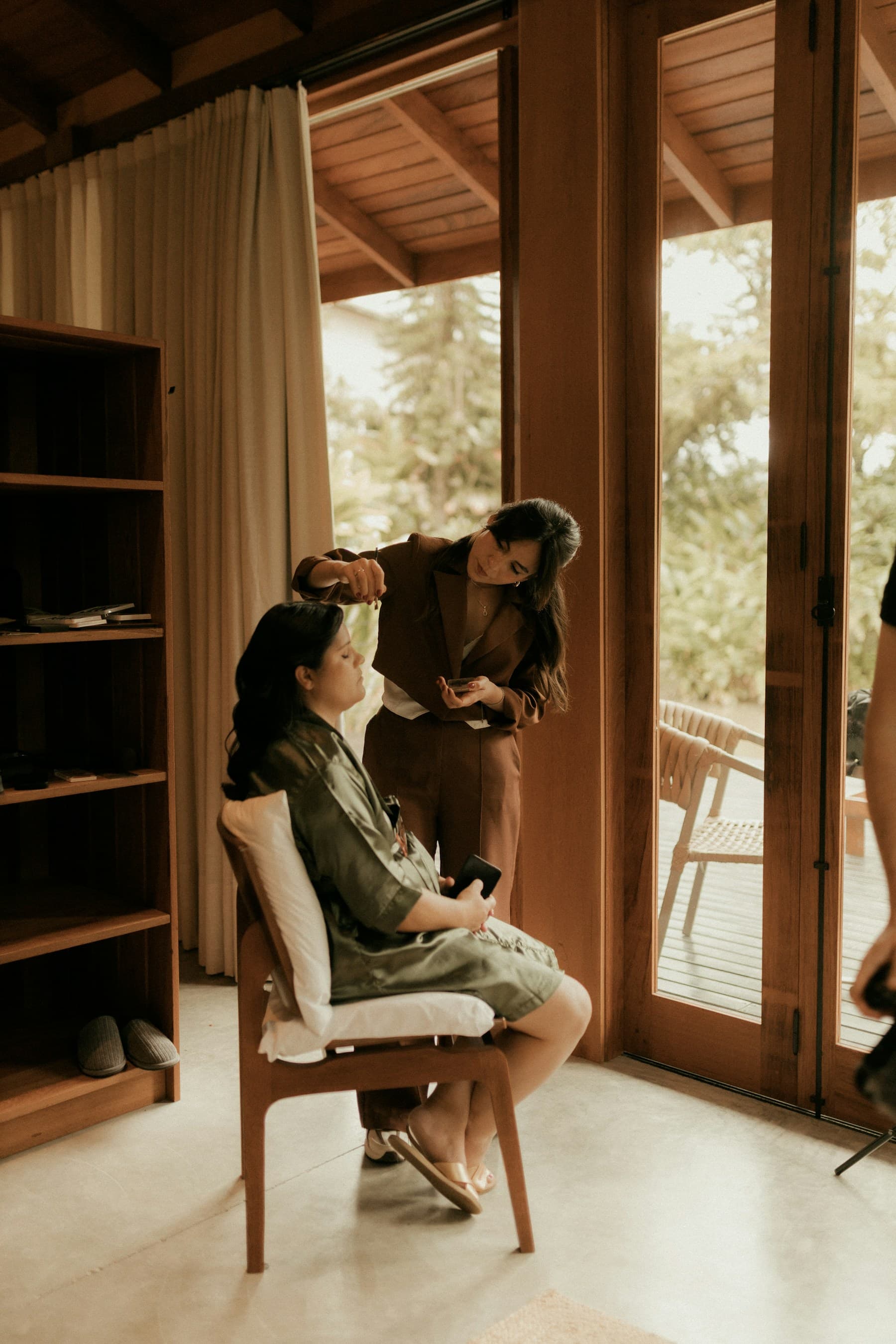 Makeup artist preparing a client